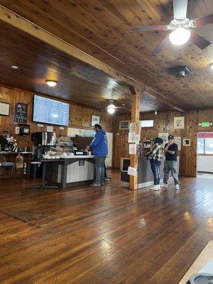 Inside ordering counter with homemade baked goods.