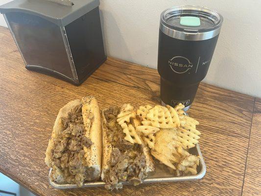 Prime beef cheesesteak & waffle fries.