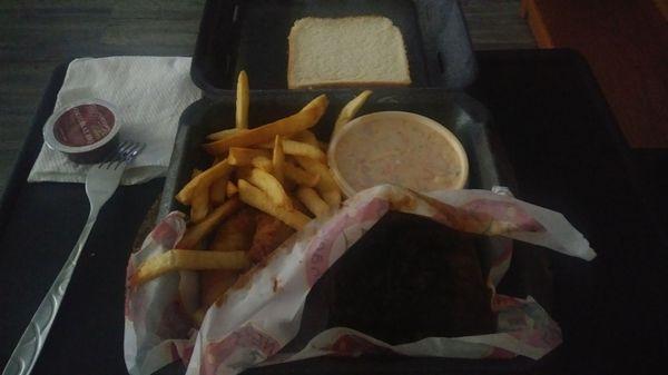 Shack Sampler, with Baby Back Ribs, BBQ Pork (under the rubs) Chicken Tenders (under the paperback by the French Fries) and Coleslaw