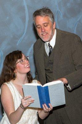 Eurydice (Mary Tominson) rediscovers how to read, with her Father (Jeff Lovell). Photo by John Lamb