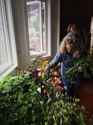 Students selecting spring blooms for their personal bouquets