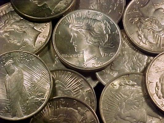 We Buy And Sell old U.S.Silver Dollars.