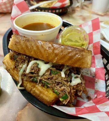 Birria Grilled Cheese sandwich PACKED with delicious juicy birria.