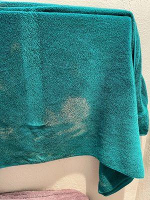 Large bleach stain on brand new towel