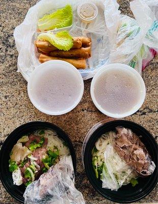 Rare steak beef noodle ( right ), Rare steak with flank, brisket .  Eggroll