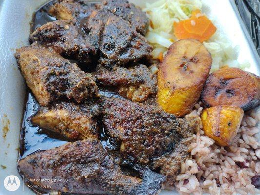 My usual fix! Large Jerk Chicken plate. Comes with peas and rice, cabbage, and plantains.  08/21/2021