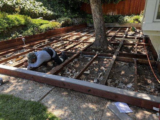 Prepping foundation for installation of Trex Composite Decking.