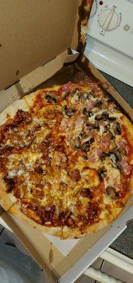 Half BBQ Chicken and Half Mushroom/Ham Pizza