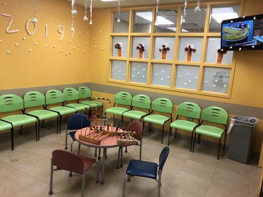 Our waiting room features toys and a television.