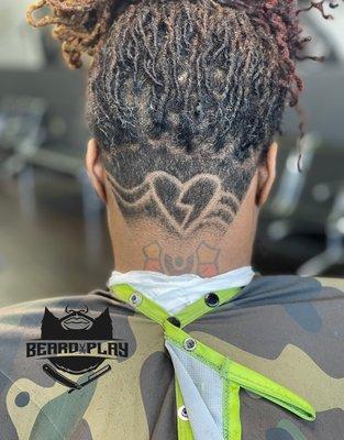 Women's undercut with design.