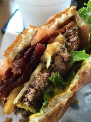 Bacon piled high on the Hawaiian best burger.