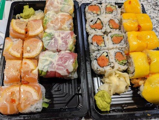 Sunshine Roll, Fuji Roll, Spicy Tuna Roll, and Yellow Mango Roll.