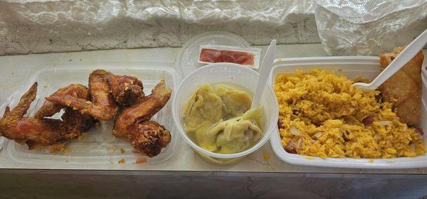 Fried chicken wings with pork fried rice and wonton soup.