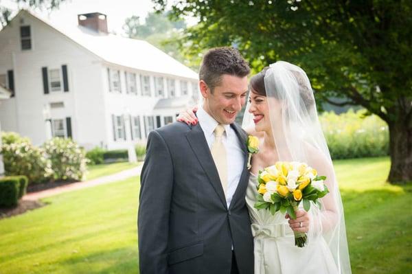 A warm, natural moment between the bride and groom.