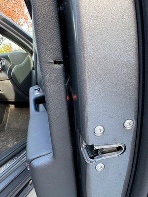 Front door panel improperly installed, clips missing.