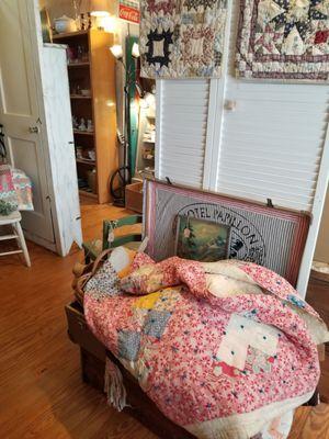 Several old quilts for sale.