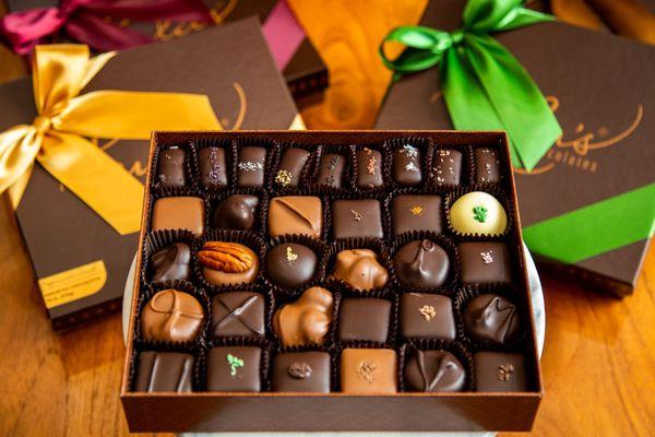 Assorted chocolates include caramels, nut clusters, butter creams, and truffles.