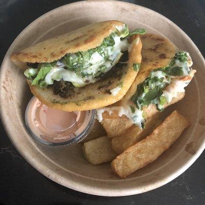 Classic chicken arepas and black bean pork avacado arepa