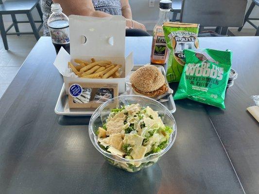 Austin Fried chicken sandwich, a Kale Caesar Salad & French Fries