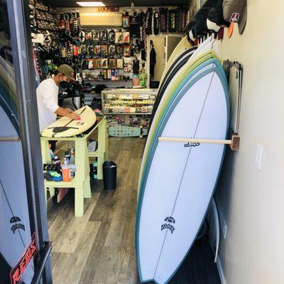 Brent, hard at work!  Come see what is new at Hapa Surf & Skate!