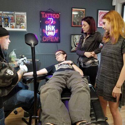 Jeff doing a first time tattoo during one of our specials