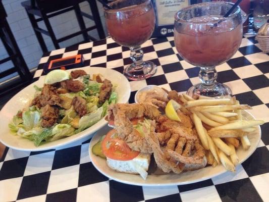 Soft shell crab poboy and Caesar salad with fried oysters and Voodoo bloody Mary's