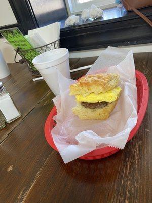 Sausage and egg and a large buttermilk biscuit