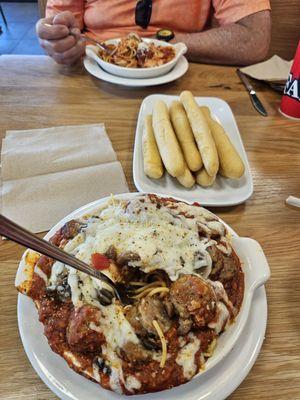 Loaded baked spaghetti and baked spaghetti and all you can eat breadsticks.