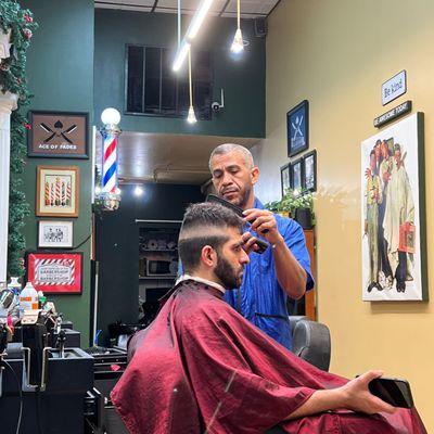 Barber in Action at Ace Of Fades Barbershop