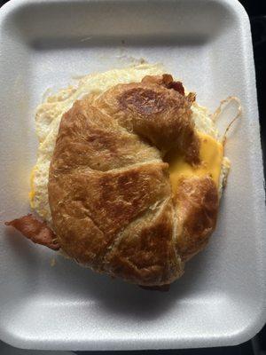 Breakfast croissant with bacon.