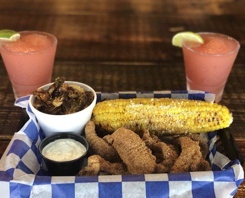 Catfish with Brussels sprouts drizzled in honey, corn on cob and Froses