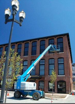 Bates Mill, Lewiston, Maine. Utilizing boom lift and 5 stage water filtration system for spot free windows.