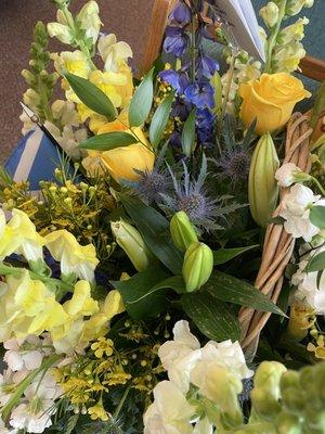 Funeral flowers. I requested thistle (national flower of Scotland) and they delivered. I'm so please with this arrangement.