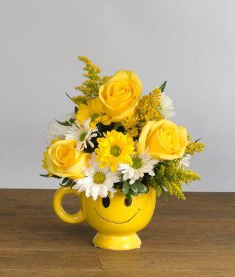 Sending someone a smile is as easy and sending them this smiling flower bouquet. The Be Happy Bouquet is the perfect give to turn someone's