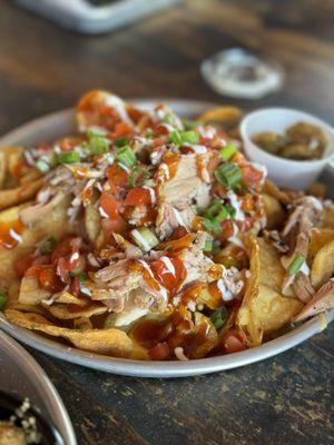 Chicken nachos on homemade potato chips