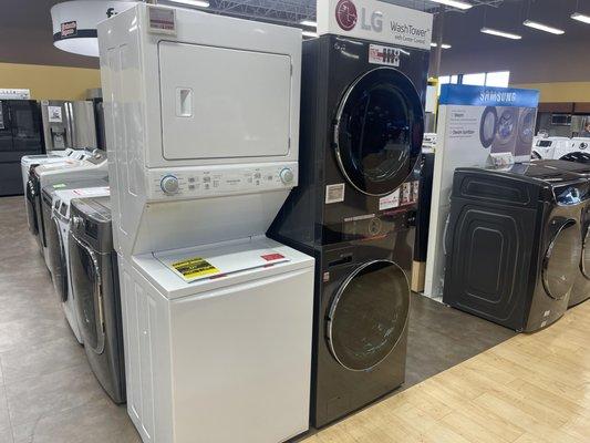 Stacked washer and dryer sets on display