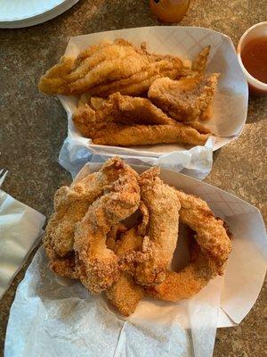 Front: 1 lb Jumbo Back: catfish dinner with fries & coleslaw