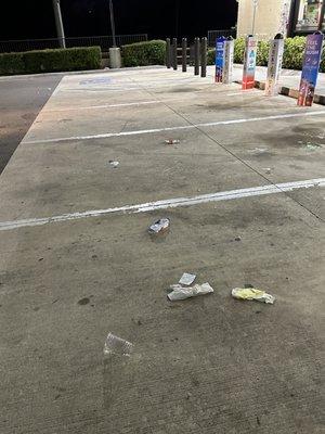 Garbage all over parking lot