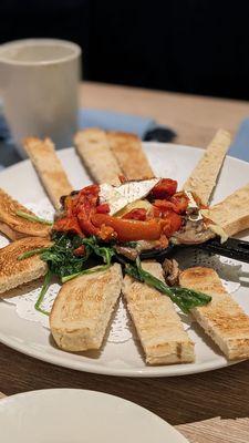 Baked brie with tomato, spinach, mushroom, and toasted bread