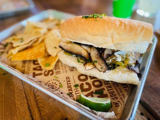 PORTOBELLA Y POBLANO $9 Sautéed portabellas, poblanos, onions, guac spread, pickled jalapenos, green cabbage, lime crema