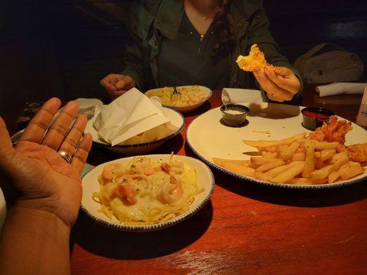 Pick 3 for $20. Well plates are bowl size, not entree,  but still filled three of us up