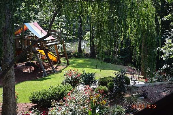 They trimmed the trees built play ground and installed landscaping.  They installed everything you see in the picture.