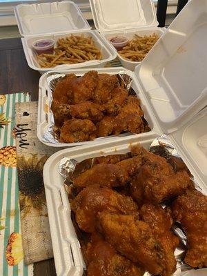 10 wings and fries. Mango express and wings way sauce.