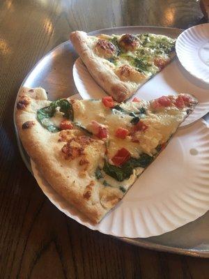 Mediterranean pizza with feta and tomatoes and pesto pizza.