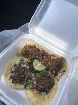 Carnitas and carne asada tacos.