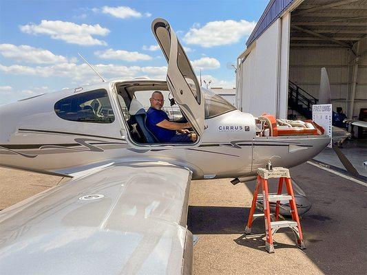 John in the cockpit.