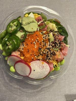 Mix 2- with tuna and salmon, brown rice, radishes, edamame, jalapeño, fish eggs, spring mix, corn, sesame seeds, wasabi.