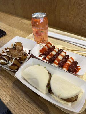 Pork buns, octopus balls, sausage and crispy rice