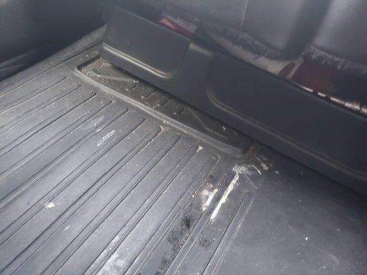 Spilled sticky stuff still on the rubber floor mats easily could have been wiped up.