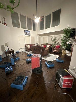 Emergency setting of fans and dehumidifiers to dryout the structure including wood floors that dried without the need for repair.